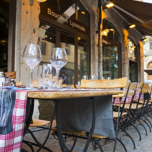 Bouchon Lyonnais "Lyon, France - July 6, 2012: Empty outdoors of a Bouchon Lyonnais, a traditional restaurant which serves typical regional dishes."